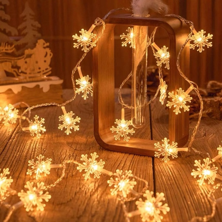 Lampki choinkowe LED snowflake/star -    3m/20 lampek ciepłe białe/warm white zasilane bat. 3xAA EHD-LS04