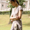 UNIQ Coehl Laurel Handstrap uniwersalnysznurek do telefonu na rękę kremowy/ivory